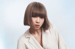 packshot of three Topchic Zero products with one tube lying in front over white background